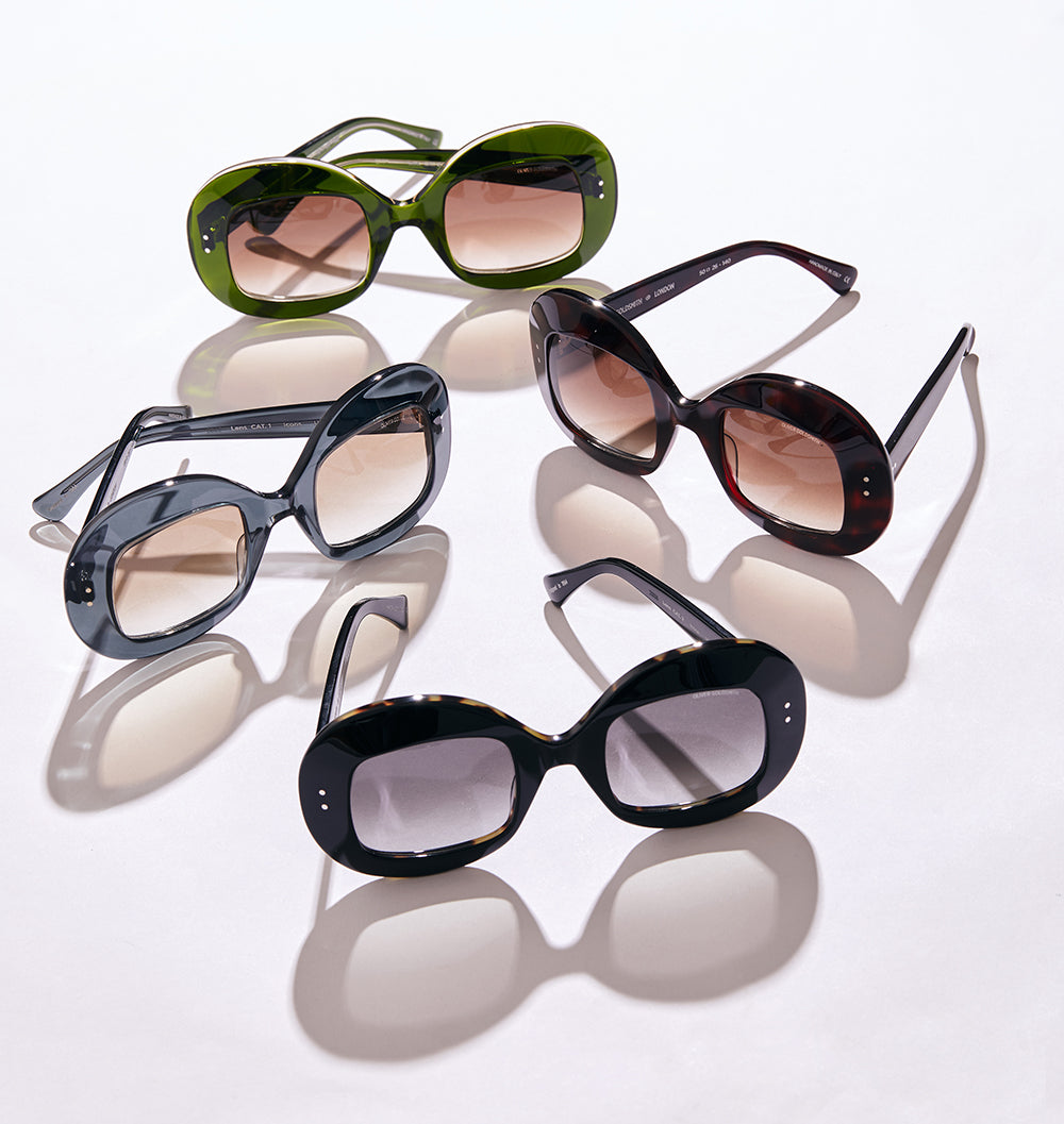 a collection of large oversized sunglasses shot on a white background